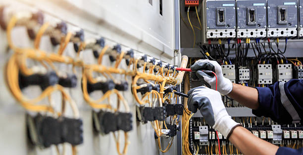 Professional Electrician technician working in Peculiar, MO